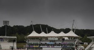 Rain delays start as England chase final wicket