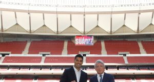 Atletico Madrid signs Luis Suarez on 2yr deal Atletico Madrid signs Luis Suarez