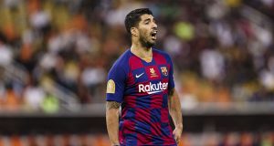 An emotional Luis Suarez said he expected to leave Barcelona