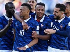 France Overcome Storm Delay to Cruise Past Iraq in World Cup Statement